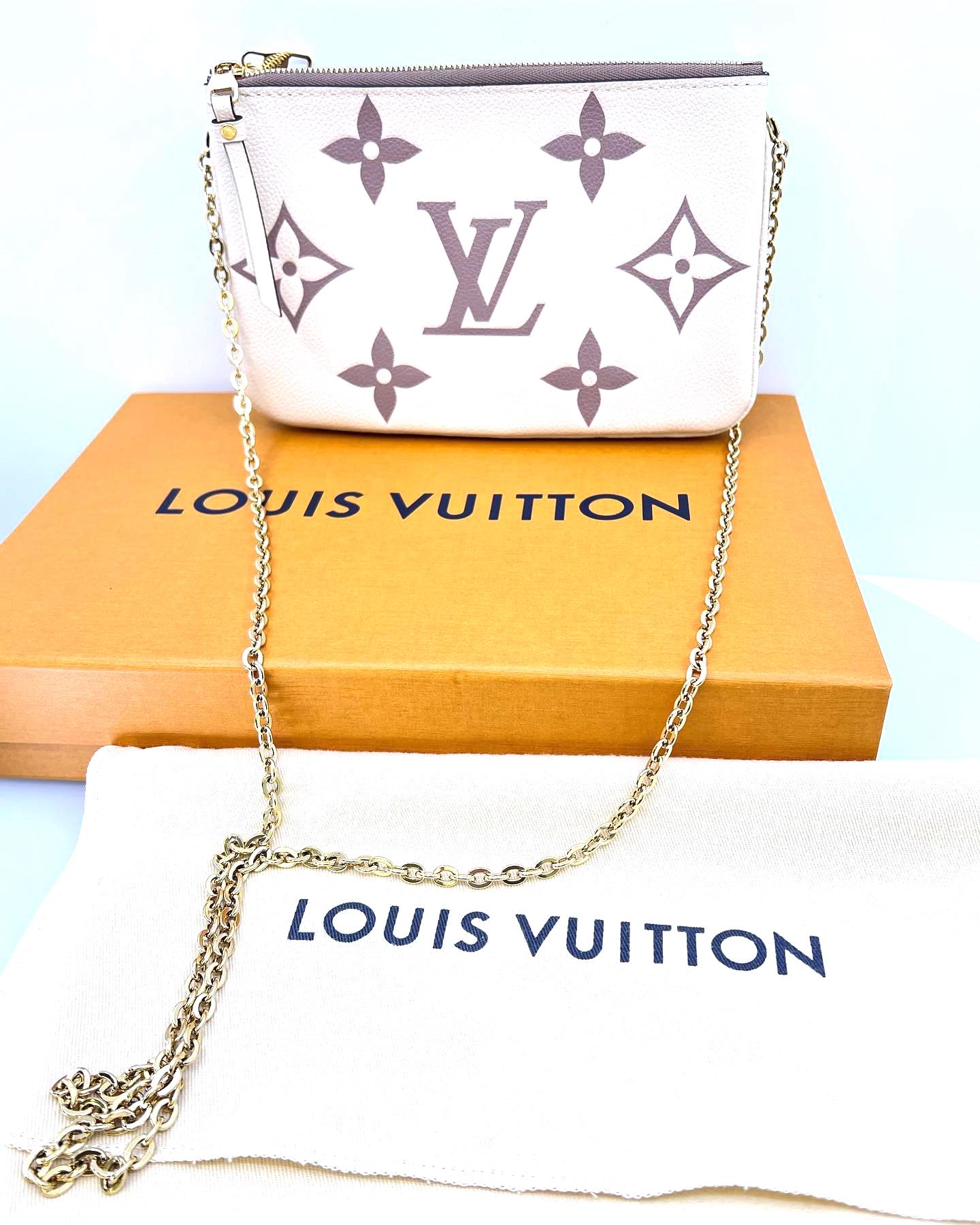 Louis Vuitton Empreinte Monogram Giant Double Zip Pochette Creme Bois de Rose