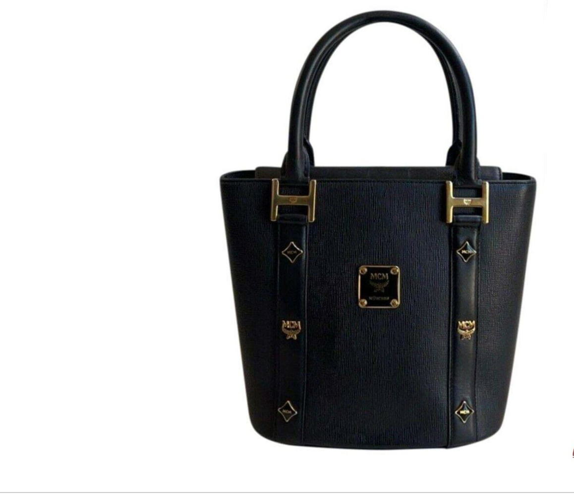 MCM MUNCHEN SAFFIANO LEATHER SMALL BUCKET BAG The Lavish Loft